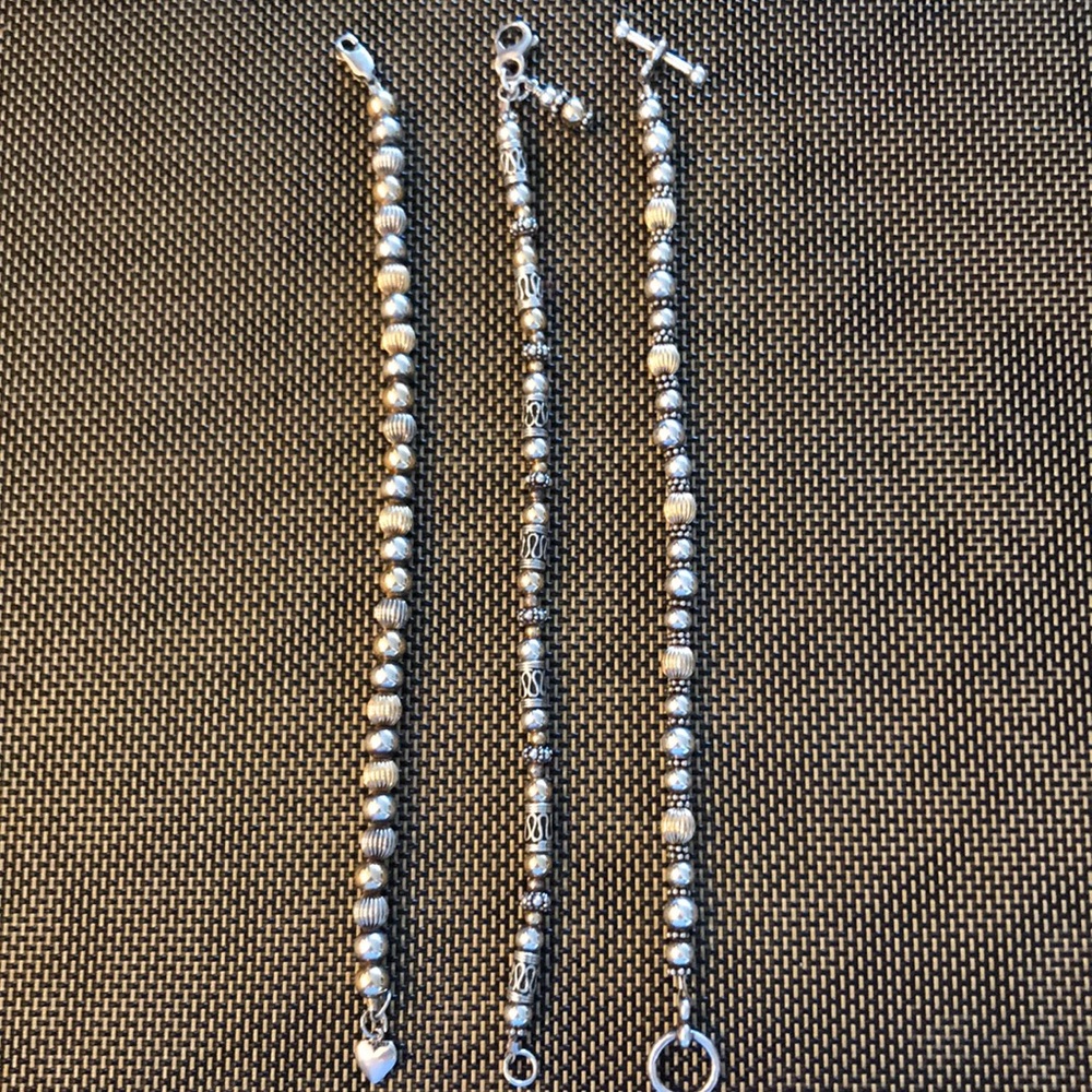 Three Two-toned Beaded Bracelets.